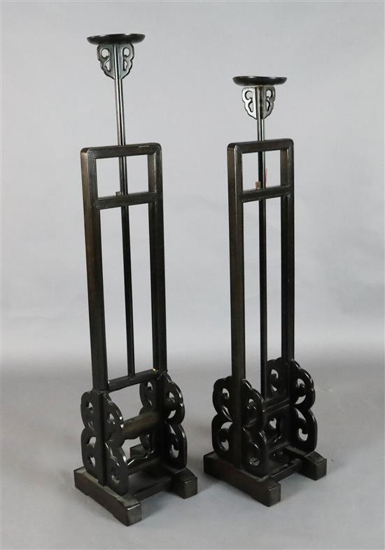 A pair of Chinese hongmu lamp stands, late 19th/early 20th century, H. 120cm at lowest position